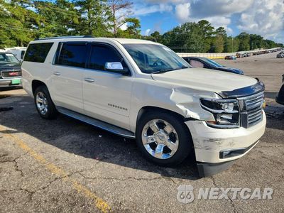 Czwarte zdjęcie samochodu z boku: 2015 CHEVROLET SUBURBAN C1500 LTZ VIN:1GNSCKKC2FR209139 - miniatura