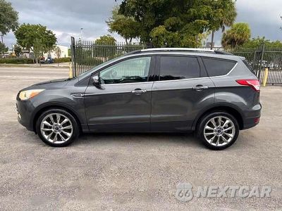 Zdjęcie 12 z 15 samochodu: 2016 FORD ESCAPE SE VIN:1FMCU0GX4GUC35892 - miniatura