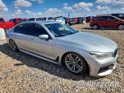 Czwarte zdjęcie samochodu z boku: 2016 BMW 750 XI VIN:WBA7F2C52GG420874 - miniatura