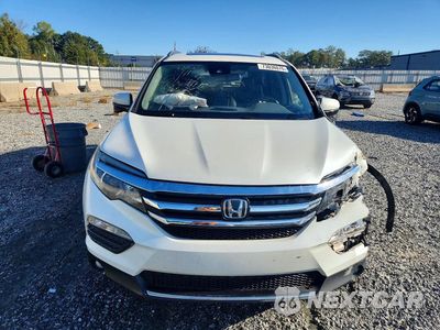 Piąte zdjęcie samochodu w środku: 2017 HONDA PILOT TOURING VIN:5FNYF5H99HB017264 - miniatura