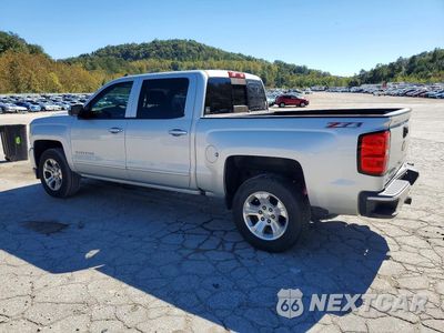 Drugie zdjęcie samochodu z przodu: 2016 CHEVROLET SILVERADO K1500 LT VIN:3GCUKREC0GG161649 - miniatura