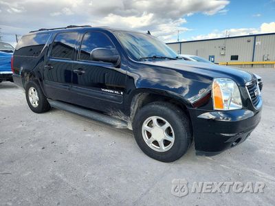 Czwarte zdjęcie samochodu z boku: 2009 GMC YUKON XL C1500 SLT VIN:1GKFC36069R199675 - miniatura