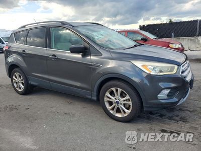 Czwarte zdjęcie samochodu z boku: 2018 FORD ESCAPE SEL VIN:1FMCU0HD6JUB58891 - miniatura