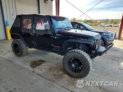 Czwarte zdjęcie samochodu z boku: 2014 JEEP WRANGLER SPORT VIN:1C4BJWDG4EL134421 - miniatura