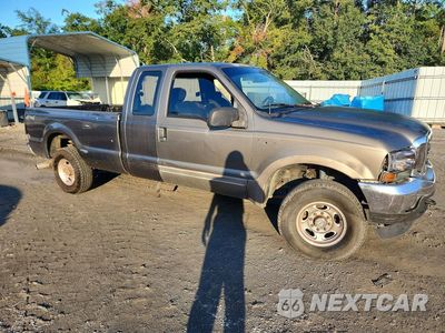 Czwarte zdjęcie samochodu z boku: 2002 FORD F250 SUPER DUTY VIN:1FTNX21F32EB72089 - miniatura