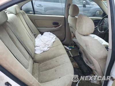 Zdjęcie 10 z 12 samochodu: 2003 HYUNDAI ELANTRA GLS VIN:KMHDN45D03U523002 - miniatura