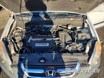 Zdjęcie 12 z 13 samochodu: 2003 HONDA CR-V EX VIN:SHSRD78833U132294 - miniatura
