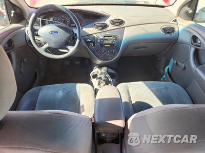 Zdjęcie 8 z 12 samochodu: 2002 FORD FOCUS LX VIN:1FAFP33P32W313680 - miniatura