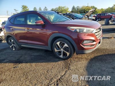 Czwarte zdjęcie samochodu z boku: 2016 HYUNDAI TUCSON LIMITED VIN:KM8J3CA22GU070434 - miniatura