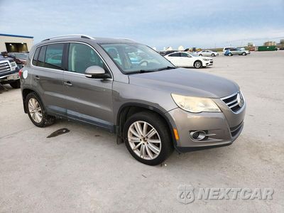Czwarte zdjęcie samochodu z boku: 2011 VOLKSWAGEN TIGUAN S VIN:WVGBV7AX3BW506349 - miniatura
