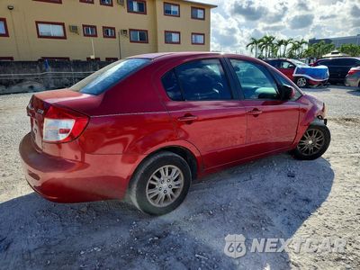 Trzecie zdjęcie samochodu z tyłu: 2013 SUZUKI SX4 LE VIN:JS2YC5A37D6100685 - miniatura