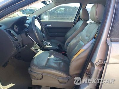 Zdjęcie 7 z 12 samochodu: 2009 FORD FOCUS SES VIN:1FAHP36N69W128763 - miniatura