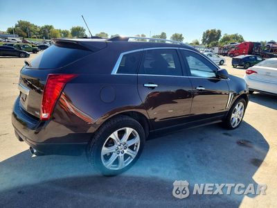 Trzecie zdjęcie samochodu z tyłu: 2015 CADILLAC SRX PERFORMANCE COLLECTION VIN:3GYFNCE39FS516126 - miniatura