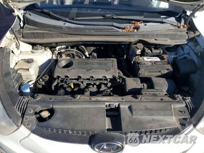 Zdjęcie 12 z 13 samochodu: 2011 HYUNDAI TUCSON GLS VIN:KM8JU3AC2BU285990 - miniatura