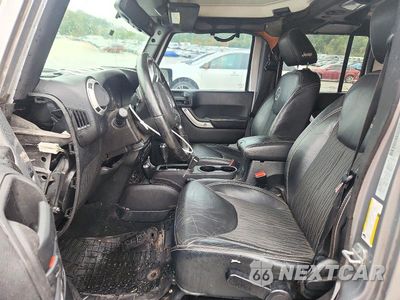 Zdjęcie 7 z 12 samochodu: 2015 JEEP WRANGLER UNLIMITED SPORT VIN:1C4BJWDG1FL612649 - miniatura