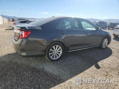 Trzecie zdjęcie samochodu z tyłu: 2012 TOYOTA CAMRY HYBRID XLE VIN:4T1BD1FK0CU063104 - miniatura