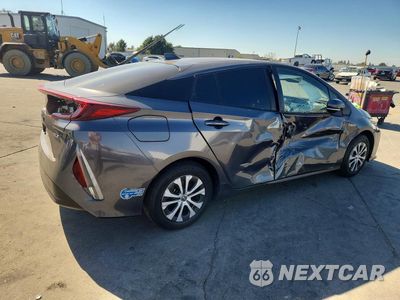 Trzecie zdjęcie samochodu z tyłu: 2021 TOYOTA PRIUS PRIME XLE VIN:JTDKAMFP1M3167330 - miniatura
