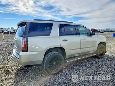 Trzecie zdjęcie samochodu z tyłu: 2016 GMC YUKON SLT VIN:1GKS2BKC4GR395607 - miniatura
