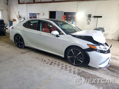 Czwarte zdjęcie samochodu z boku: 2020 TOYOTA CAMRY XSE VIN:4T1K61AKXLU858405 - miniatura