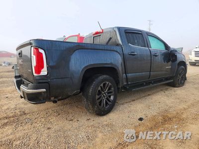 Trzecie zdjęcie samochodu z tyłu: 2019 GMC CANYON SLE VIN:1GTG5CEN4K1305990 - miniatura