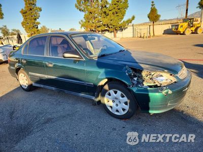Czwarte zdjęcie samochodu z boku: 1999 HONDA CIVIC LX VIN:2HGEJ6671XH546825 - miniatura