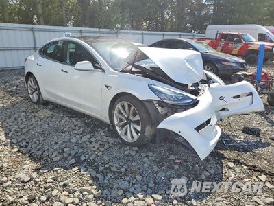 Czwarte zdjęcie samochodu z boku: 2020 TESLA MODEL 3 VIN:5YJ3E1EC3LF586996 - miniatura