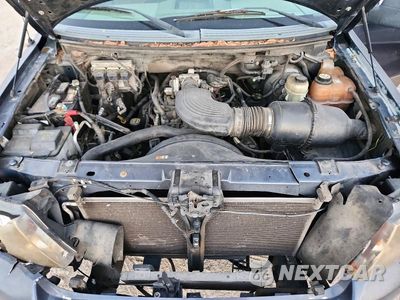 Zdjęcie 11 z 12 samochodu: 2006 FORD F150 SUPERCREW VIN:1FTRW12W76KB42081 - miniatura