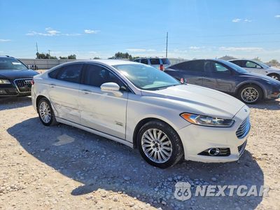 Czwarte zdjęcie samochodu z boku: 2014 FORD FUSION TITANIUM PHEV VIN:3FA6P0SU9ER383116 - miniatura