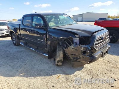 Czwarte zdjęcie samochodu z boku: 2019 TOYOTA TACOMA SR5 V6 VIN:3TMDZ5BN0KM078713 - miniatura