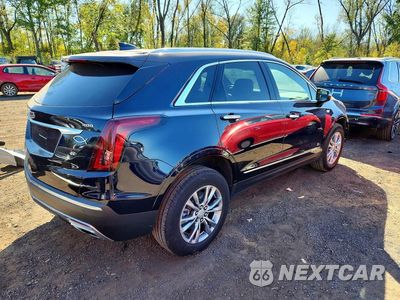 Trzecie zdjęcie samochodu z tyłu: 2022 CADILLAC XT5 PREMIUM LUXURY VIN:1GYKNDRSXNZ105731 - miniatura