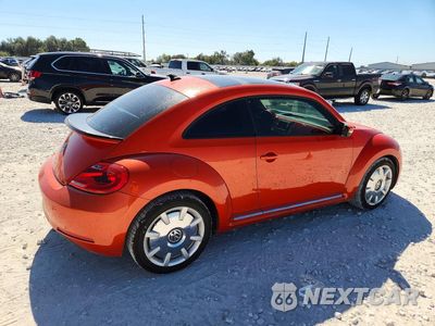 Trzecie zdjęcie samochodu z tyłu: 2016 VOLKSWAGEN BEETLE SE VIN:3VWJ07AT1GM627056 - miniatura