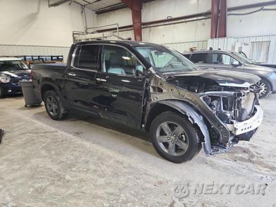 Czwarte zdjęcie samochodu z boku: 2023 HONDA RIDGELINE RTL-E VIN:5FPYK3F77PB020929 - miniatura