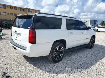 Trzecie zdjęcie samochodu z tyłu: 2018 CHEVROLET SUBURBAN C1500 LT VIN:1GNSCHKC9JR327751 - miniatura