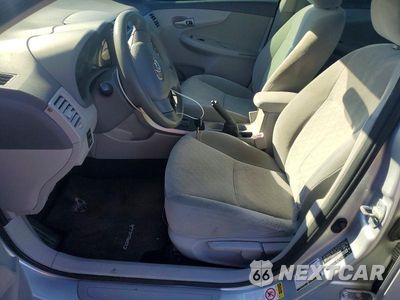 Zdjęcie 7 z 12 samochodu: 2009 TOYOTA COROLLA LE VIN:JTDBL40EX9J018533 - miniatura