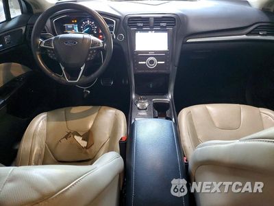 Zdjęcie 8 z 13 samochodu: 2017 FORD FUSION TITANIUM HEV VIN:3FA6P0RU4HR399914 - miniatura