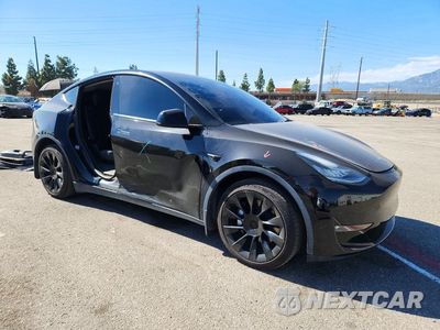 Czwarte zdjęcie samochodu z boku: 2022 TESLA MODEL Y VIN:7SAYGDEE6NF458342 - miniatura