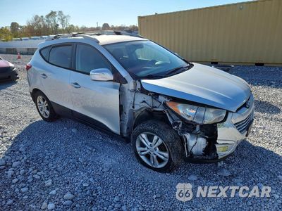 Czwarte zdjęcie samochodu z boku: 2012 HYUNDAI TUCSON GLS VIN:KM8JUCAC9CU372285 - miniatura