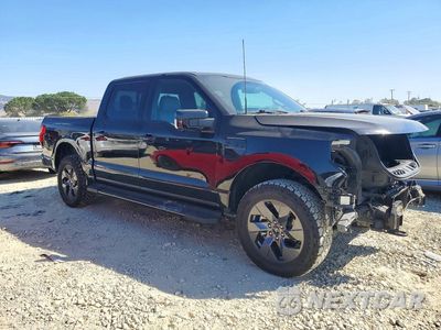 Czwarte zdjęcie samochodu z boku: 2022 FORD F150 LIGHTNING PRO VIN:1FT6W1EV1NWG13235 - miniatura