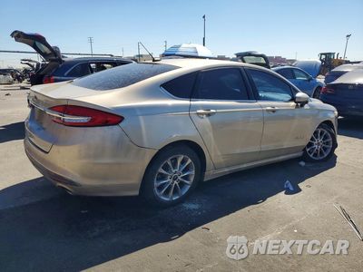 Trzecie zdjęcie samochodu z tyłu: 2017 FORD FUSION SE HYBRID VIN:3FA6P0LU6HR264846 - miniatura