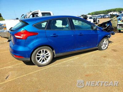 Trzecie zdjęcie samochodu z tyłu: 2018 FORD FOCUS SE VIN:1FADP3K28JL330648 - miniatura