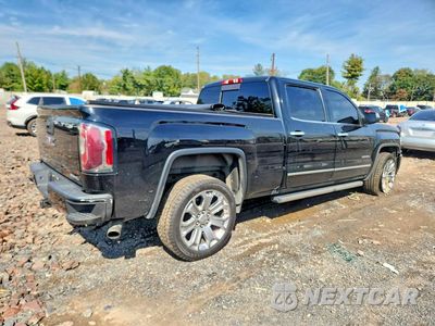 Trzecie zdjęcie samochodu z tyłu: 2017 GMC SIERRA K1500 DENALI VIN:3GTU2PEJ6HG400156 - miniatura