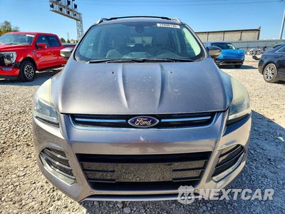 Piąte zdjęcie samochodu w środku: 2014 FORD ESCAPE TITANIUM VIN:1FMCU0J9XEUA04339 - miniatura