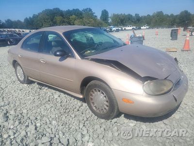 Czwarte zdjęcie samochodu z boku: 1999 MERCURY SABLE LS VIN:1MEFM53U3XG642030 - miniatura