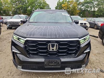 Piąte zdjęcie samochodu w środku: 2025 HONDA PILOT TOURING VIN:5FNYG1H79SB074690 - miniatura