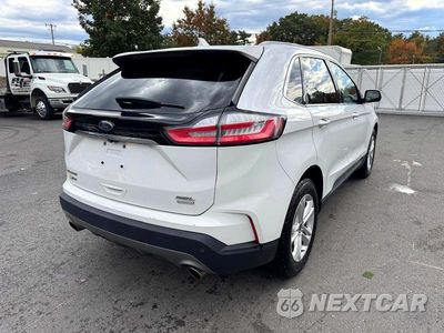 Trzecie zdjęcie samochodu z tyłu: 2020 FORD EDGE SEL VIN:2FMPK3J96LBA58345 - miniatura