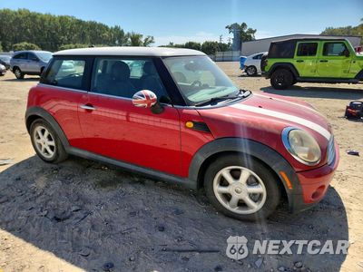 Czwarte zdjęcie samochodu z boku: 2010 MINI COOPER VIN:WMWMF3C58ATU77880 - miniatura