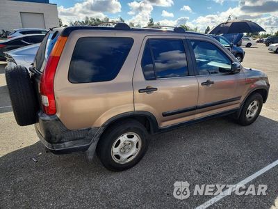 Trzecie zdjęcie samochodu z tyłu: 2003 HONDA CR-V LX VIN:JHLRD68493C013454 - miniatura
