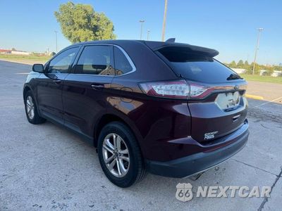 Trzecie zdjęcie samochodu z tyłu: 2018 FORD EDGE SEL VIN:2FMPK3J88JBC12123 - miniatura