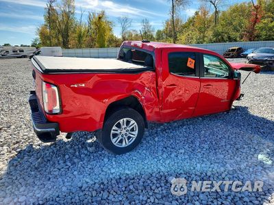 Trzecie zdjęcie samochodu z tyłu: 2019 GMC CANYON SLE VIN:1GTG6CEN8K1294134 - miniatura