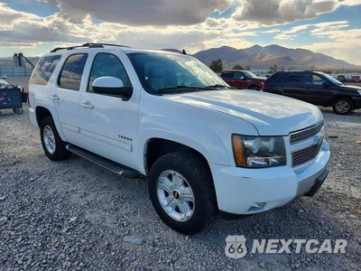 Czwarte zdjęcie samochodu z boku: 2010 CHEVROLET TAHOE K1500 LT VIN:1GNUKBE00AR196171 - miniatura